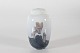 Royal CopenhagenSlim lidded jarwith flower motif